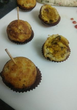 A picture of Rava-Moong Dal Kachoris in Appam Maker.