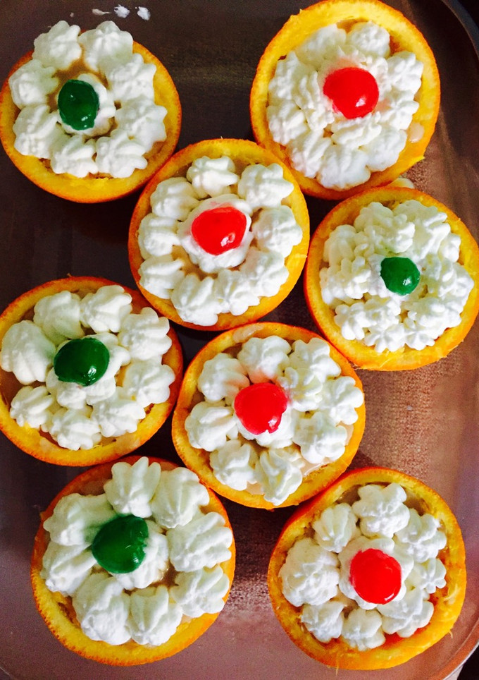 Una foto de Naranjas Rellenas de cookie cream