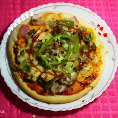 A picture of Pizza shahi paneer.