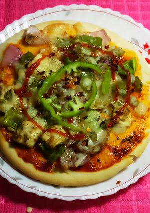 A picture of Pizza shahi paneer.