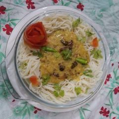 A picture of Charcoal tarkah Dal with Noddles.
