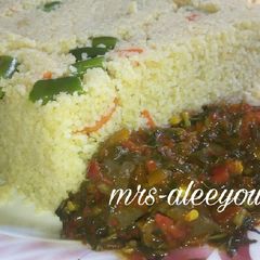 A picture of Vegetable cous-cous with liver sauce.