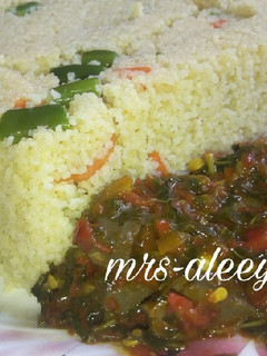 A picture of Vegetable cous-cous with liver sauce.