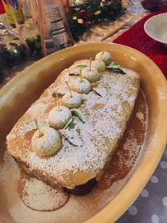 A picture of Apple Cake with Chocolate and Caramel Sauce.
