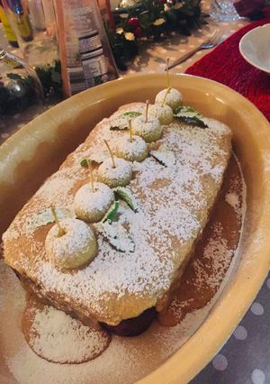 A picture of Apple Cake with Chocolate and Caramel Sauce.