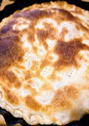Una foto de Tarta de jamón y queso clásica