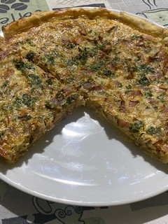 Una foto de Tarta de panceta y cebolla