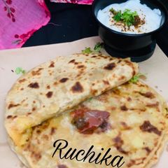 A picture of Punjabi Aloo Paratha with anardana.