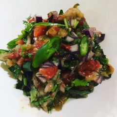 A picture of Mangal salad (fire roasted vegetable salad).