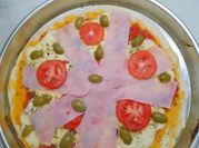 Una foto de pizza paleta