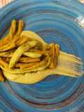 Casarecce di ceci su cremina di seppe e pesto di Erba cipollina