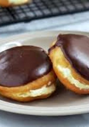 Una foto de Donas de vainilla cubiertas con chocolate