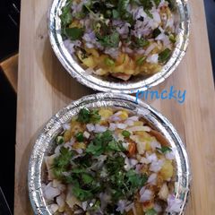 A picture of Street style matar chole chaat in pressure cooker.
