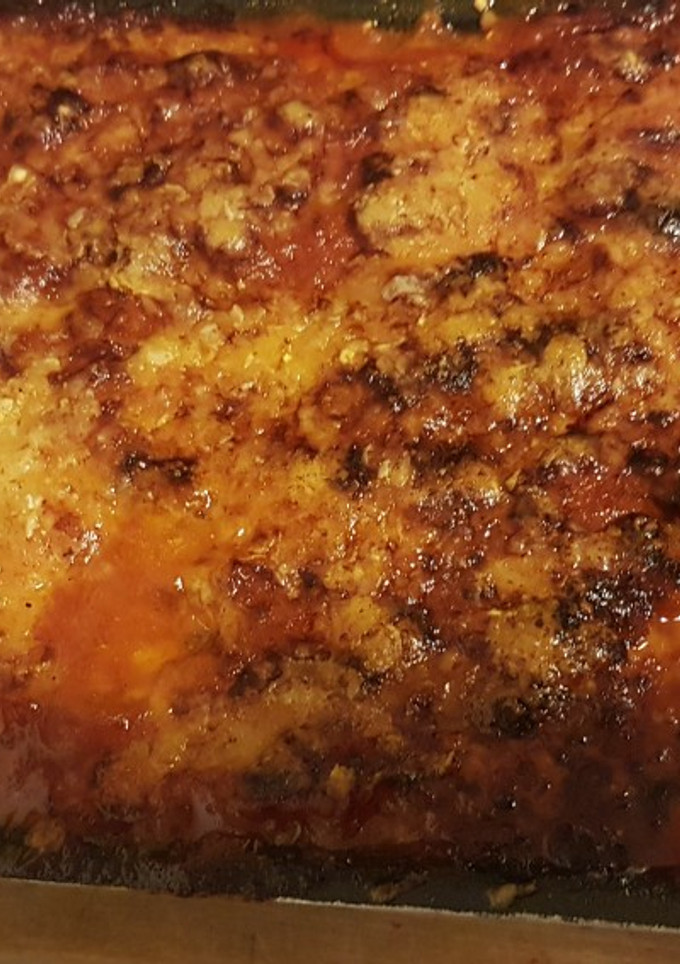 Una foto de Berenjenas a la parmigiana con cierto aire clásico