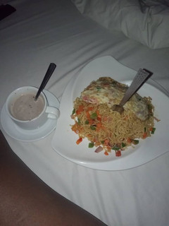 A picture of Indomie and egg wit hot tea 😉.