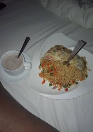 A picture of Indomie and egg wit hot tea 😉.