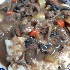 A picture of Beef Kidney Stew over Mash.