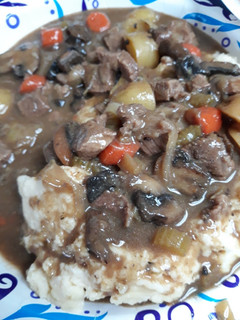 A picture of Beef Kidney Stew over Mash.