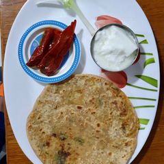 A picture of Cauliflower and spring onion paratha.