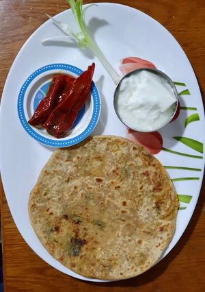 A picture of Cauliflower and spring onion paratha.