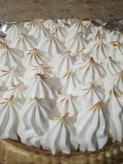 Una foto de Tartaleta de crema de limón y merengue