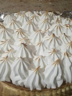 Una foto de Tartaleta de crema de limón y merengue