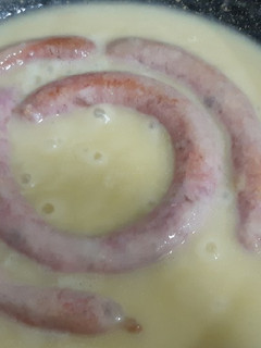 Una foto de Salchichas al vino