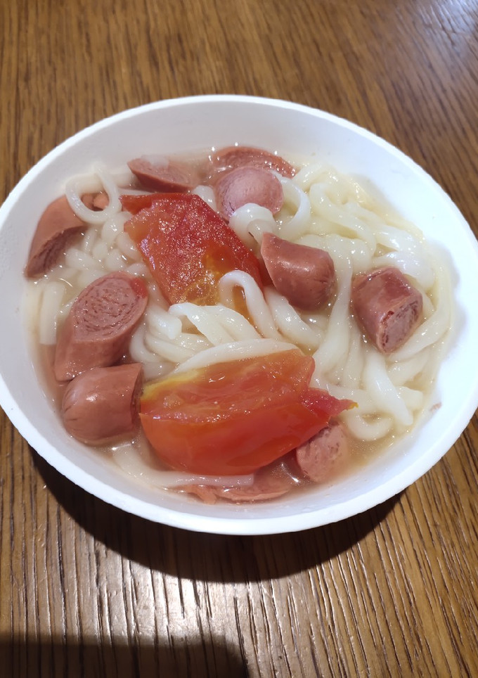 A picture of Udon with Sausage.