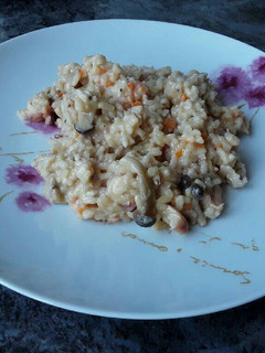 Una foto de Risotto de pulpo y langostinos