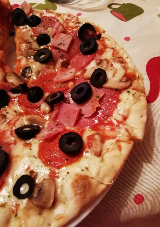 Una foto de Pizza de domingo noche