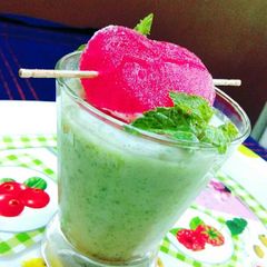 A picture of Minty chaas with rosey heart.
