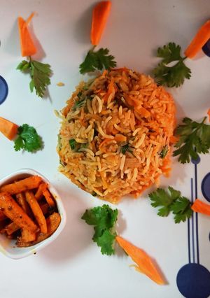 A picture of Schezwan carrot rice with carrot sabzi.