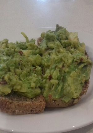 A picture of Snack time Spicy Crushed Avocado on wholegrain toast.