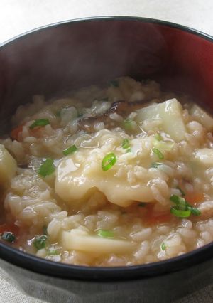 A picture of Zōsui (Rice Soup) with Dumplings.