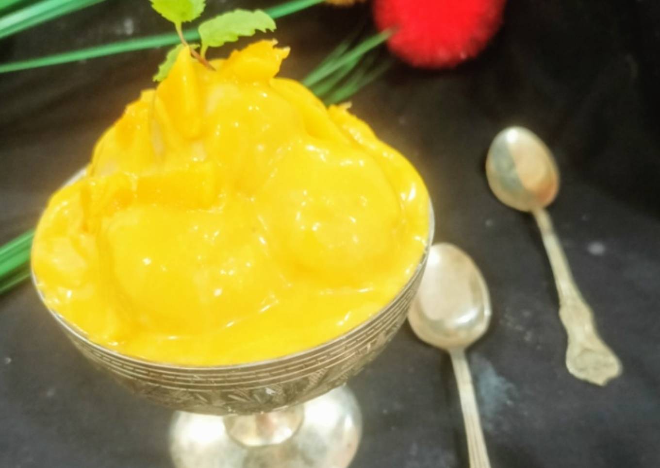 Mango dessert with small rasgulla