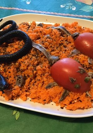 Une photo de Souris de tomates sur champ de carottes (anchois,câpres, algues et melfor)