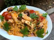 Una foto di pasta con moscardini