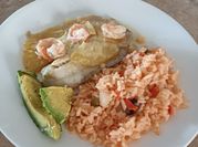 Una foto de camarones al ajo con mantequilla