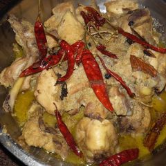 A picture of Chicken rezala.