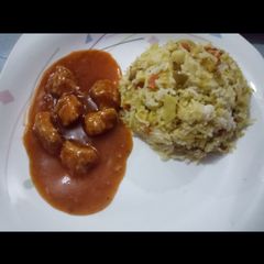 A picture of Fried Rice With Chicken Manchurain.