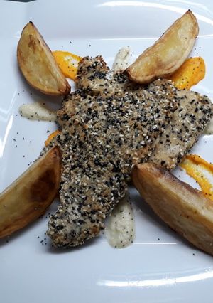 Una foto de Merluza apanada con semillas