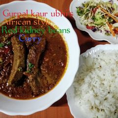 A picture of African style red kidney beans curry 🍅🧄🌶️🌻🧅🌿.