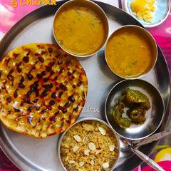 A picture of Rajasthani Koba Roti & Churma.