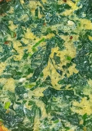 A picture of Vietnamese Fried Eggs with Wild Betel Leaves.