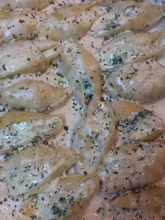 A picture of Chicken and Broccoli Alfredo Stuffed Shells.