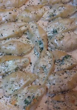 A picture of Chicken and Broccoli Alfredo Stuffed Shells.