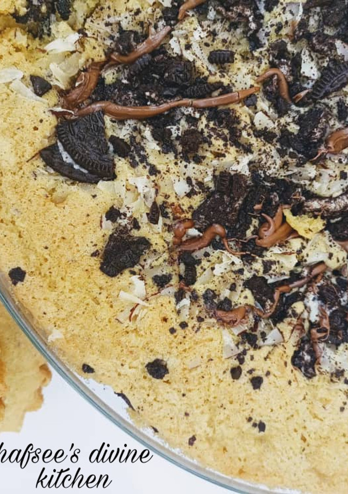 A picture of Vanilla cake with some toppings.
