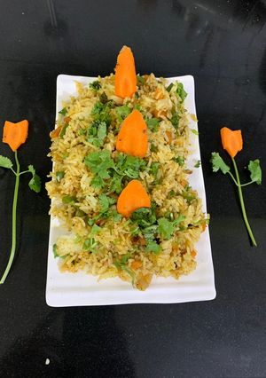 A picture of Veg rice pulao from left over rice.