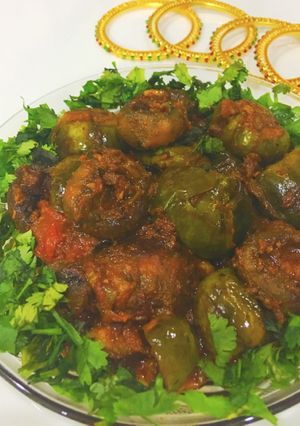 A picture of Stuffed mushroom baingan masala.