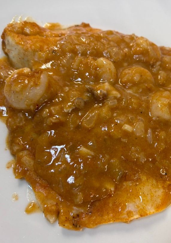 Una foto de Dorada o Lubina a la marinera en Airfryer Cosori